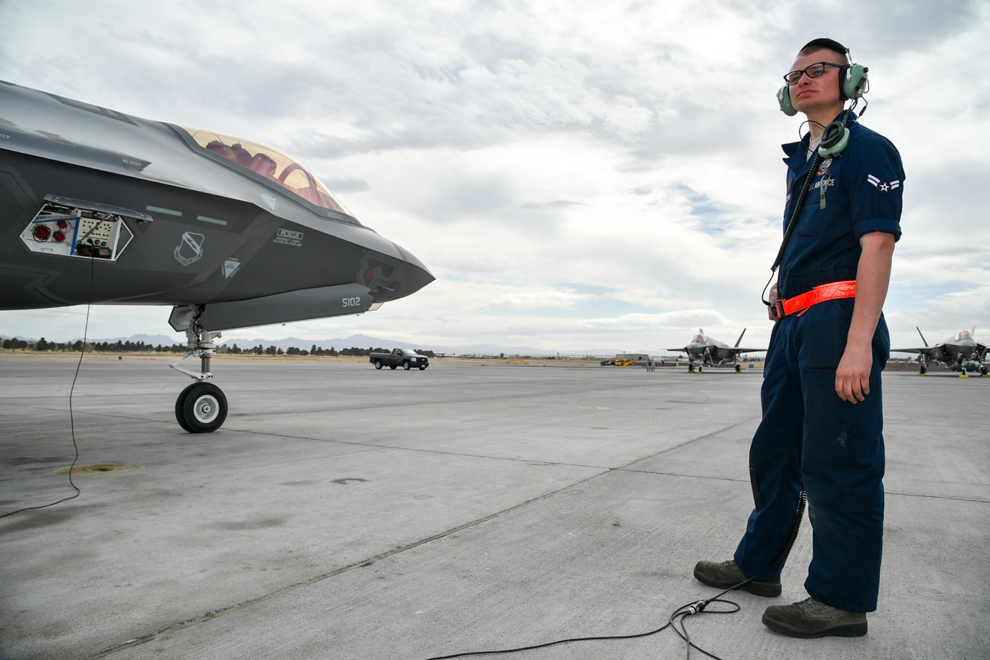 Airman 1st Class Nathan Kosters, a crew chief with the 34th Aircraft Maintenance Unit, prepares to launch an F-35A Lightning II aircraft during Red Flag 17-1 at Nellis Air Force Base, Nevada, Feb. 7, 2017. (U.S. Air Force photo/R. Nial Bradshaw)