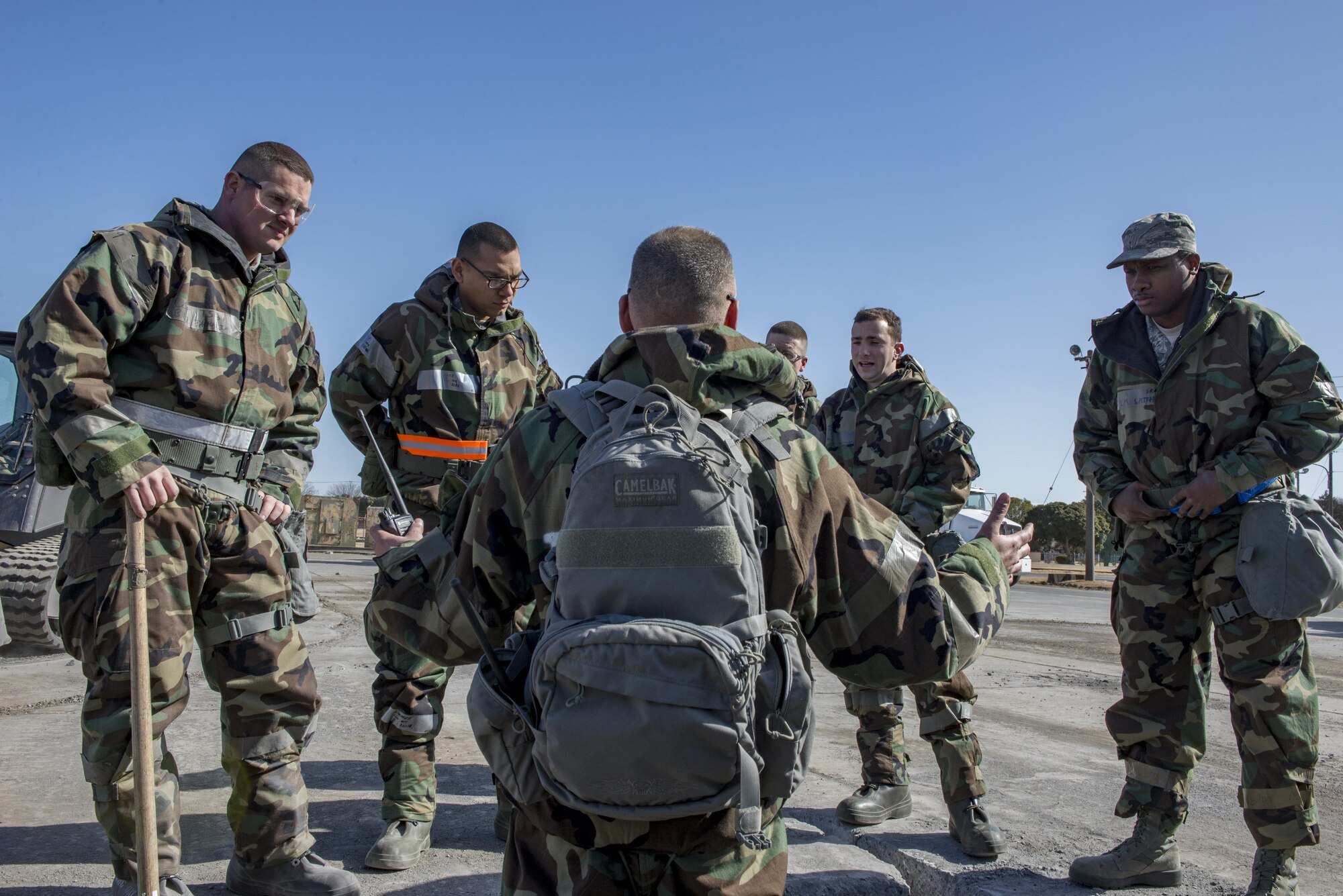 Airmen with the 374th Civil Engineering Squadron discuss accomplishments after a Rapid Airfield Damage Repair exercise Feb. 8, 2017, at Yokota Air Base, Japan. 21 Airmen from the 374 CES participated in the RADR exercise. (U.S. Air Force photo by Airman 1st Class Donald Hudson)