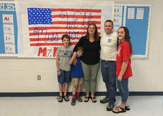 Master Sgt. Jason Paseur, the 386th Air Expeditionary Wing historian, poses for a photo with his family at Trion High School in northwest Georgia. He is a reservist at Dobbins Air Reserve Base, Ga. and teaches history as a civilian. (Courtesy photo)