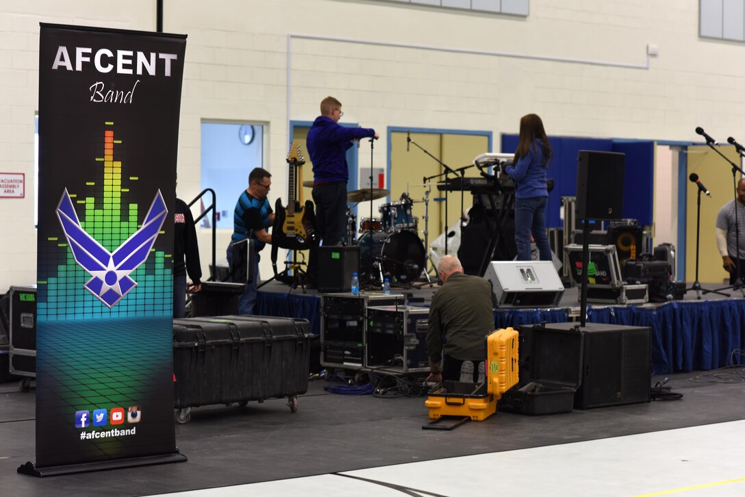 U.S.  Air Force Airmen with the Air Force Central Command Band “Systems Go” prepare for a performance at the American School of Doha, Qatar, Feb. 3, 2017. The U.S. Air Force Central Command Band is the first and only permanently assigned Air Force Band to the U.S. Central Command area of responsibility. (U.S. Air Force photo by Senior Airman Cynthia A. Innocenti)