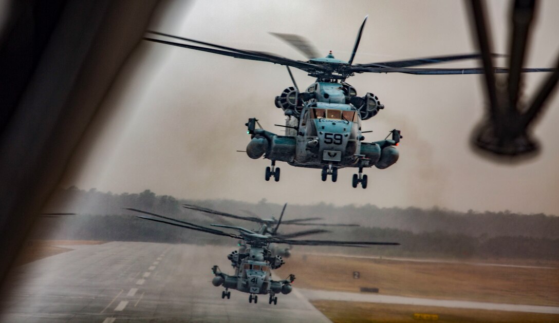 U.S. Marine Corps CH-53E Super Stallions take a during a “Max Launch”, Marine Corps Air Station New River, Feb. 3, 2017. The purpose for this flight is to celebrate a rarely achieved maintenance goal of having all aircraft operational at one time.