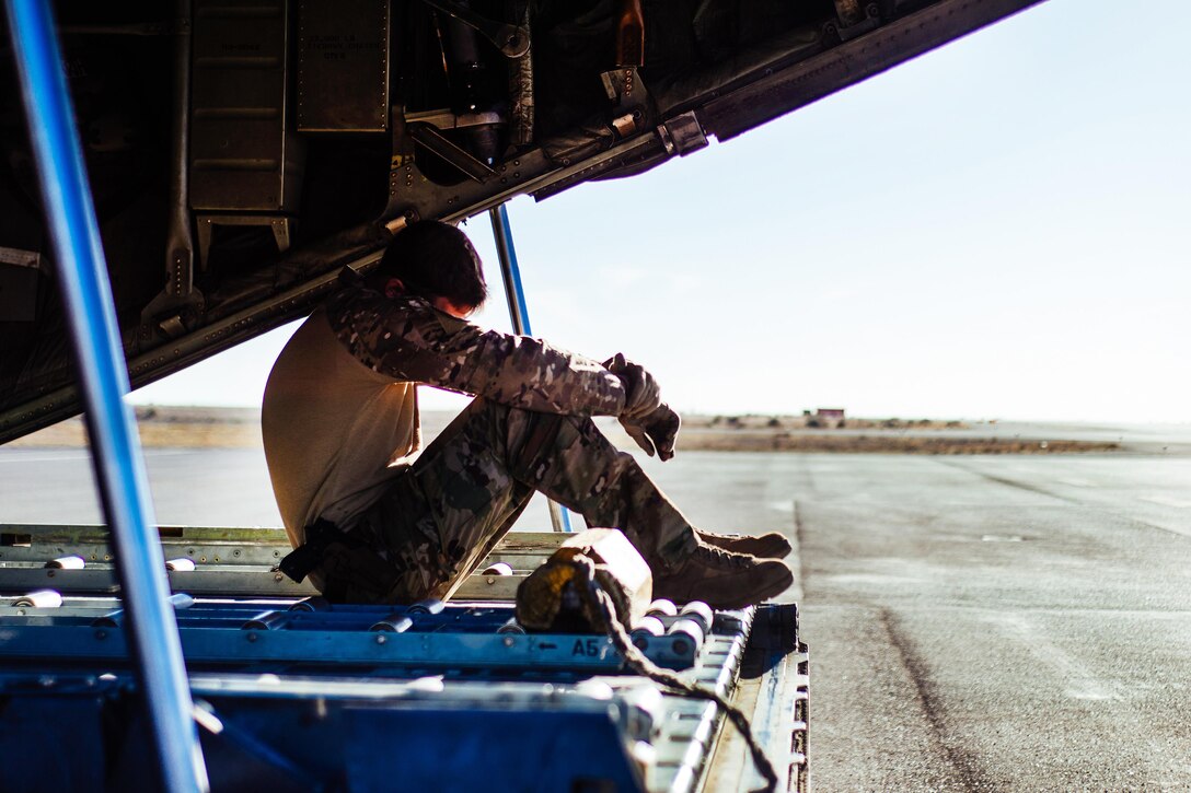 Air Force Staff Sgt. Nick Barth takes a break while waiting for the remainder of the crew he is flying with to complete preflight checks for a C-130H Hercules aircraft before takeoff from a Southeast Asia location, Feb. 4, 2017. Barth is a loadmaster assigned to the Illinois Air National Guard’s 737th Expeditionary Airlift Squadron. Air Force photo by Senior Airman Jordan Castelan