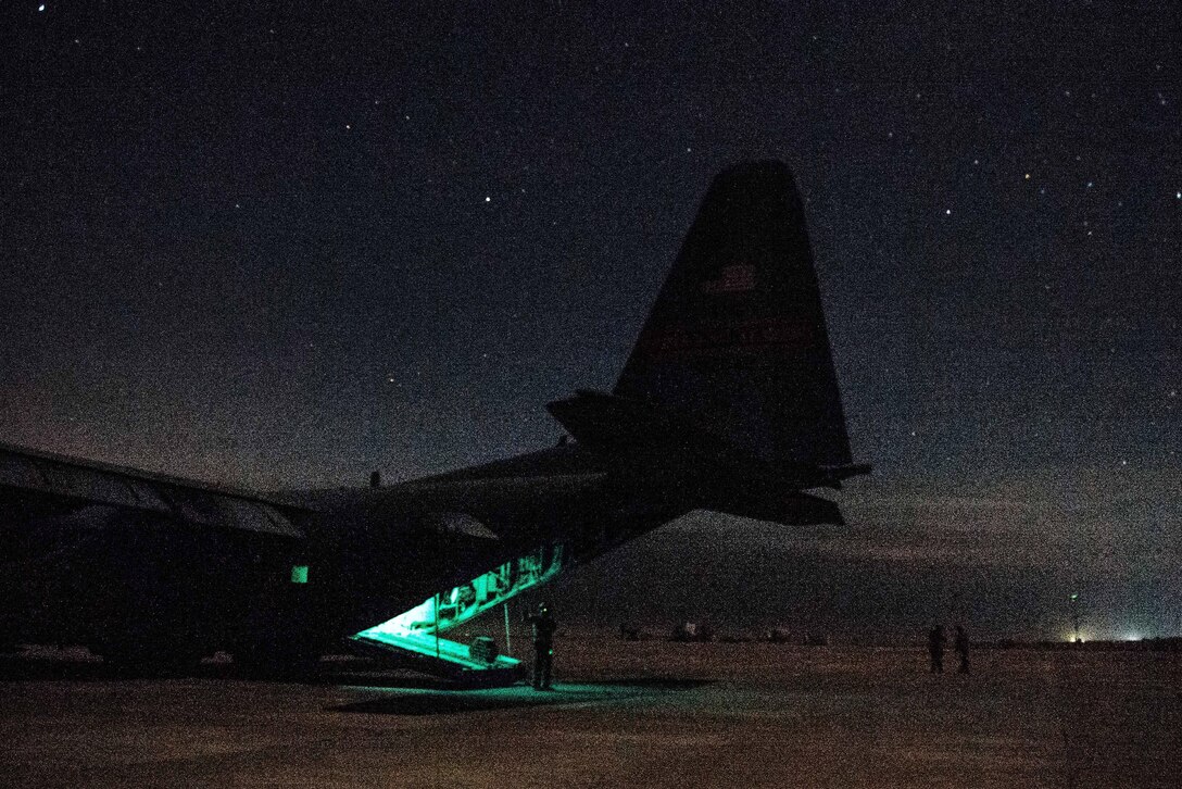 Air Force Staff Sgt. Nick Barth finishes unloading cargo on a C-130H Hercules aircraft at Qayyarah West Airfield, Iraq, Feb. 4, 2017. Barth is a loadmaster assigned to the Illinois Air National Guard’s 737th Expeditionary Airlift Squadron. Air Force photo by Senior Airman Jordan Castelan