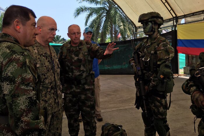 Navy Adm. Kurt W. Tidd, commander of U.S. Southern Command, second from left, is briefed on the equipment used by an elite Colombian Army unit in their efforts to disrupt narco-traffickers in the country during a visit to Tumaco, Colombia, Apr. 20, 2016. Photo courtesy of the Colombian Armed Forces