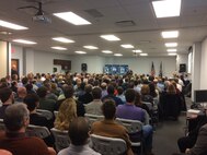 170208-N-BK152-014
Vice Adm. Thomas Moore, commander, Naval Sea Systems Command (NAVSEA), speaks at a town hall event with Naval Surface Warfare Center, Crane Division (NSWC Crane) employees in attendance on Feb. 8, 2017 at NSWC Crane. Moore is holding town hall events throughout the NAVSEA to brief his campaign to “Expand the Advantage”. (U.S. Navy photo by NSWC Crane/Released)
