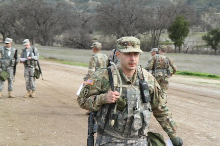 U.S. Army Reserve Sgt Juan Padilla sets off for land navigation during the Best Warrior competition, Fort Hunter Liggett, Calif. on February 7, 2017. Competitors must find four points within three hours.