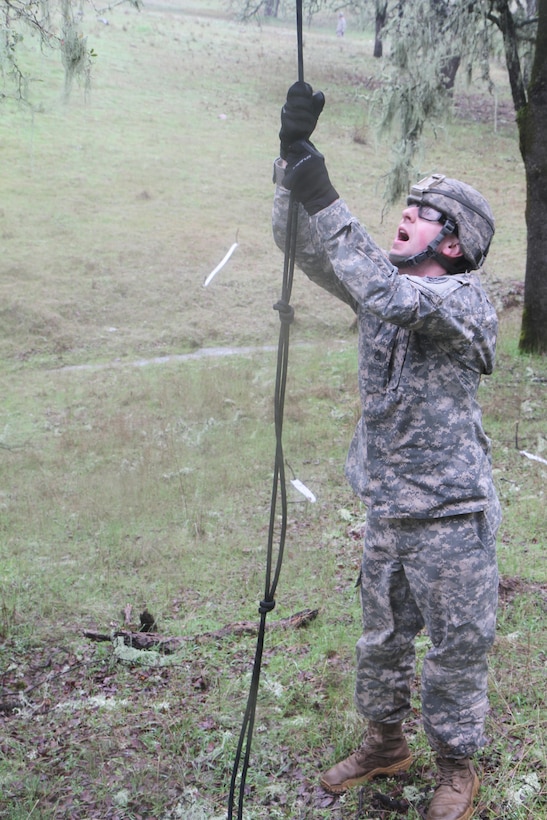 U.S. Army Reserve soldier SSgt Matthew Cassidy prepares for the rope climb during obstacle course portion of the Best Warrior Competition, Fort Hunter Liggett, Calif. on February 7, 2017. The rope climb was the second obstacle during the obstacle course and was a timed event. 