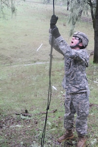 U.S. Army Reserve soldier SSgt Matthew Cassidy prepares for the rope climb during obstacle course portion of the Best Warrior Competition, Fort Hunter Liggett, Calif. on February 7, 2017. The rope climb was the second obstacle during the obstacle course and was a timed event. 