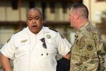 Maj. Gen. Glenn H. Curtis, adjutant general of the Louisiana National Guard, speaks with New Orleans Police Chief Michael Harrison after a tornado hit New Orleans East on Feb. 7, 2017. 