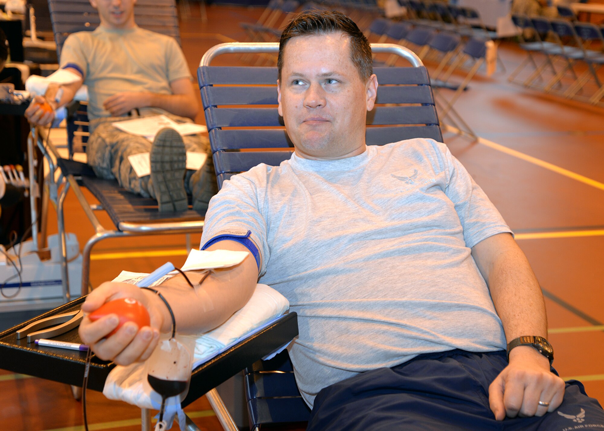 U.S. Air Force Tech. Sgt. Dallas Allen, 488th Intelligence Squadron cryptologic language analyst, donates blood at the Armed Services Blood Program blood drive Feb. 7, 2017, on RAF Mildenhall, England. Throughout the day, military members, civilians, retirees and family members age 17 and older, donated blood which will be taken to Landstuhl Regional Medical Center, Germany. From there, the blood will be used to support missions in European Command, Central Command and Africa Command, as well as in military treatment facilities. (U.S. Air Force photo by Karen Abeyasekere) 