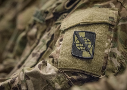 A U.S. Army Reserve Soldier wears the 359th Theater Tactical Signal Brigade patch during a welcome home ceremony for the 392nd Expeditionary Signal Battalion at Fort Hood, Texas, Feb. 6, 2017.