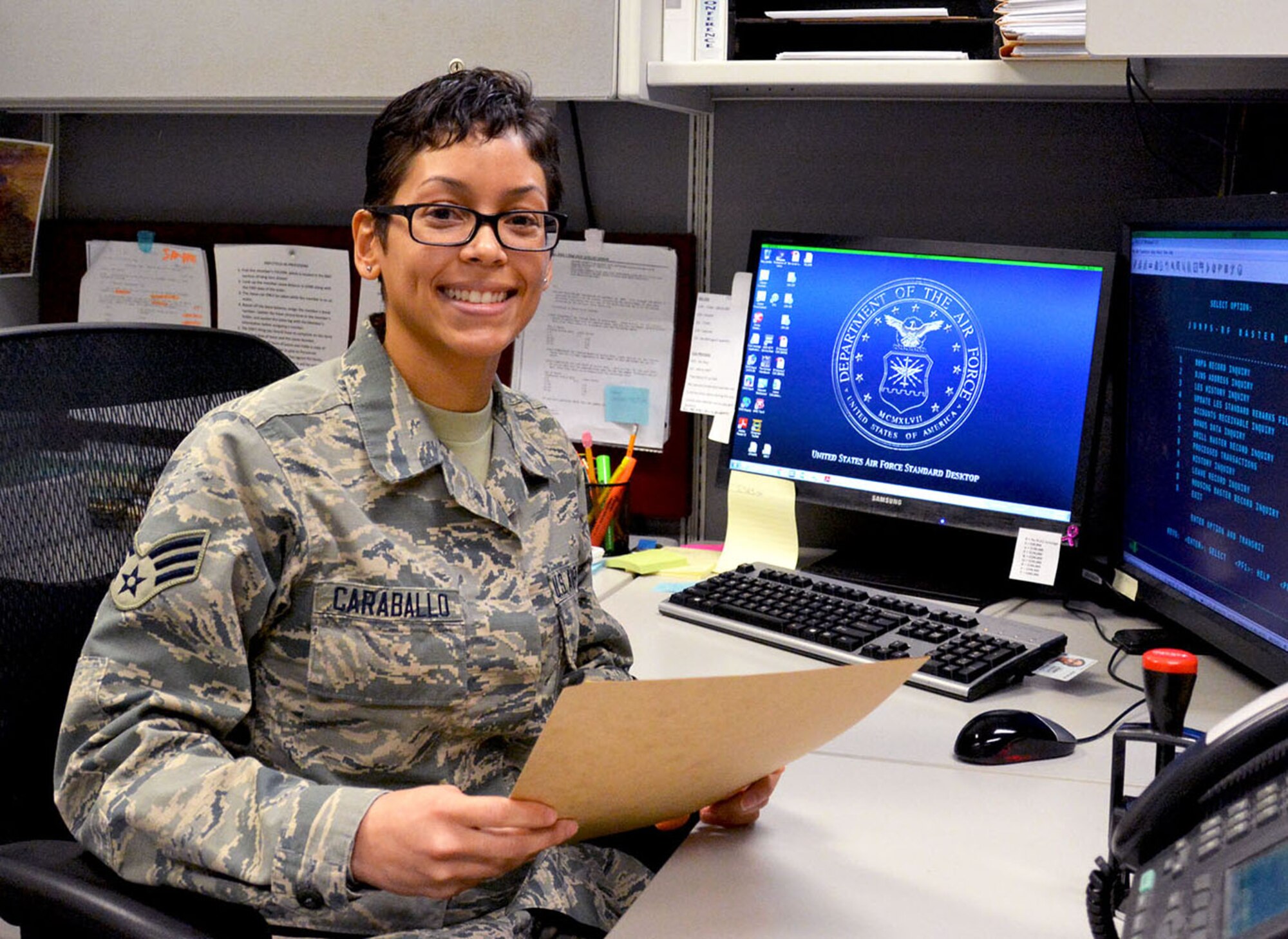 Senior Airman Margarite Caraballo, a 301st Finance office military pay technician, poses for a photo Feb. 4, 2017, at Naval Air Station Fort Worth Joint Reserve Base, Texas. Caraballo is part of a team that won the Major General Alfred K. Flowers Comptroller Organization of the year and the Financial Services Office of the Year awards for 2016. (U.S. Air Force photo by Staff Sgt. Samantha Mathison)