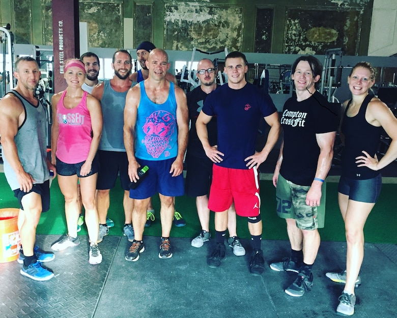 Lance Cpl. Scott Kesler (third from the right), a rifleman with Company C, 1st Battalion, 25th Marines, 4th Marine Division, poses for a photo after completing a CrossFit workout in Meadville, Pa., Jan. 2, 2017. When Kesler is not drilling as a Reserve Marine, he is pursuing his goal to become a health and physical education teacher, while also working as a personal trainer. 