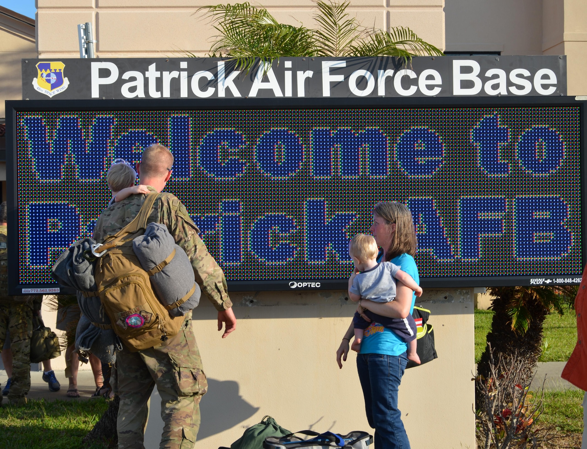 Air Force reservists greet their friends and family on the flight line at Patrick Air Force Base, Fla., upon return from a four-month deployment Feb. 8, 2017. Approximately 50 wing reservists returned from Afghanistan and were transported to Patrick by an Air Force C-17 Globemaster aircraft. (U.S. Air Force photo by 1st Lt. Anna-Marie Wyant)