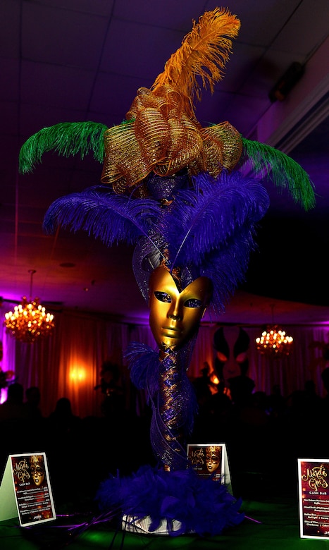 Colorful decorations are set on display during the Mardi Gras event hosted at the Fort Eustis Club at Joint Base Langley-Eustis, Va., Feb, 3, 2017. Traditional Mardi Gras colors include purple, green and gold which signify justice, faith and power. (U.S. Air Force photo by Staff Sgt. Teresa J. Cleveland)