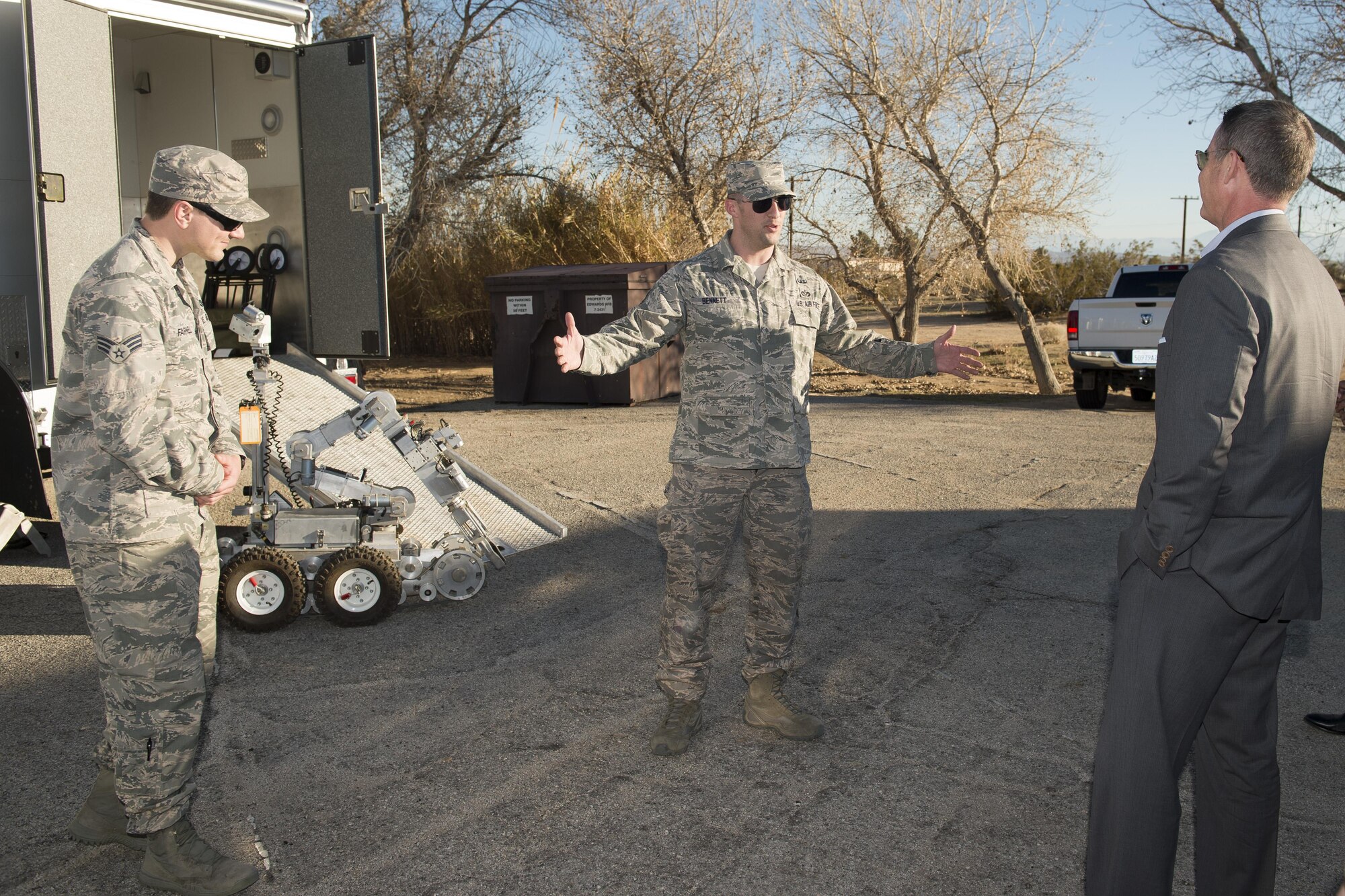 Jeff Gorell, deputy mayor for Homeland Security and Public Safety, Los Angeles (right), meets with Explosive Ordnance Disposal Airmen from the 812th Civil Engineering Squadron Jan. 31. (U.S. Air Force photo by Ethan Wagner)