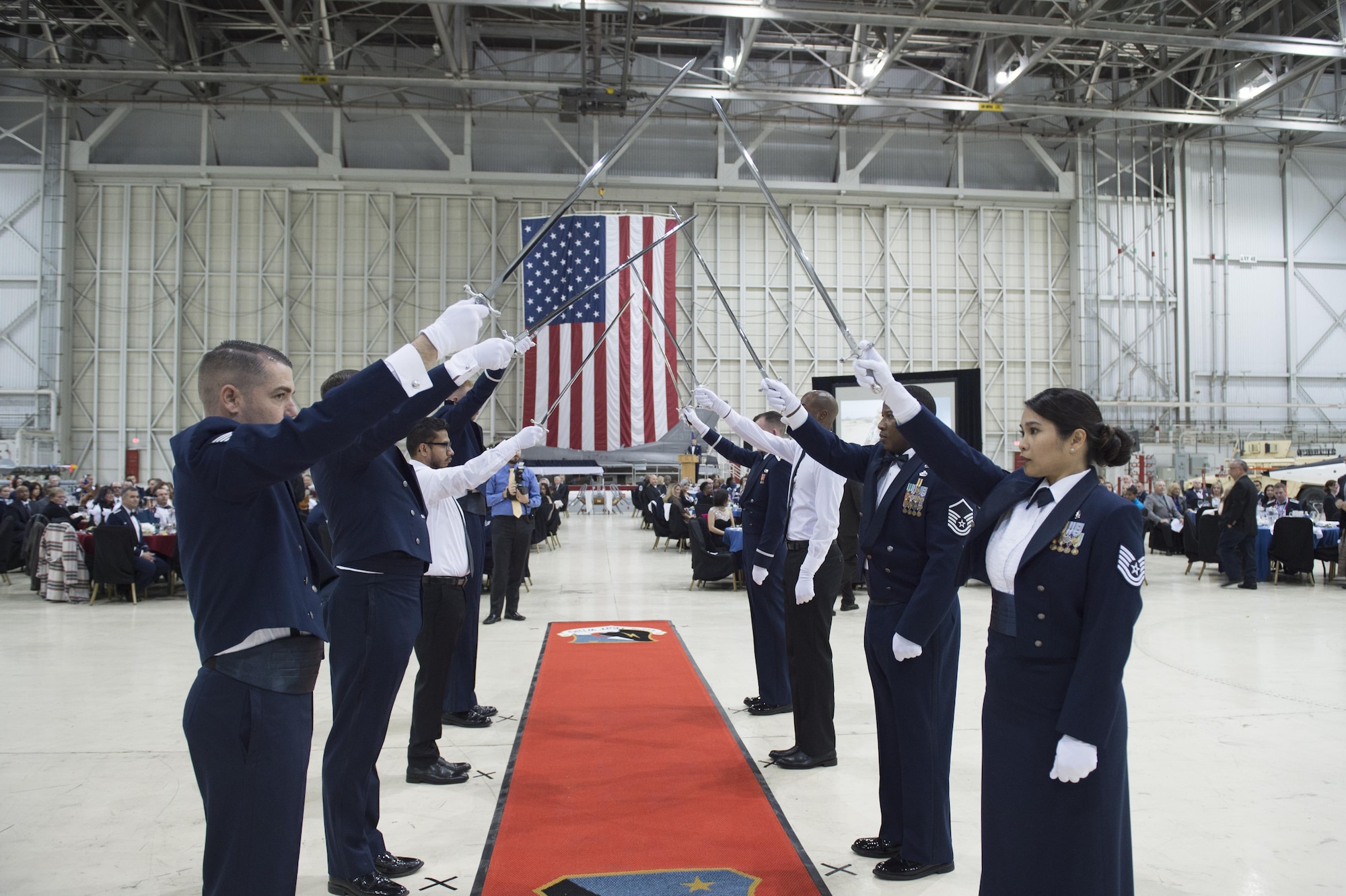 The Saber Cordon is ready for award nominees to pass under at the beginning of the 412th Test Wing Annual Awards Banquet in Hangar 1600 Feb. 3. (U.S. Air Force photo by Joseph Gocong)