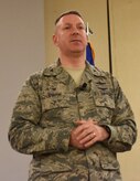 Col. Robert Lyman, 628th Air Base Wing commander, addresses Airmen during a commander’s call at the Charleston Club Feb 3, 2017. The commander’s call covered plans for the dining facility, the importance of safe driving and a briefing about the blended retirement plan.