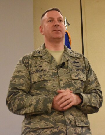 Col. Robert Lyman, 628th Air Base Wing commander, addresses Airmen during a commander’s call at the Charleston Club Feb 3, 2017. The commander’s call covered plans for the dining facility, the importance of safe driving and a briefing about the blended retirement plan.