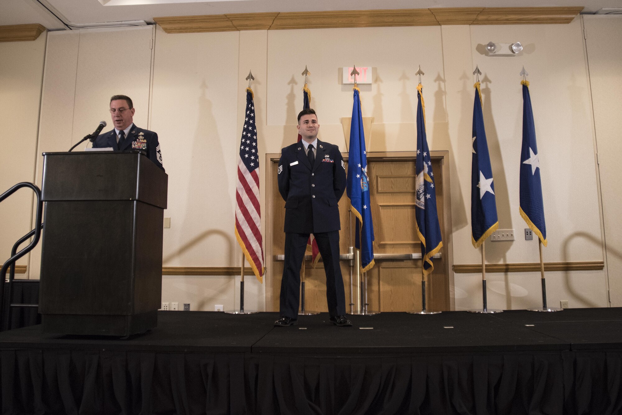 Ohio Command Chief Master Sgt. Tom Jones, recognizes Staff Sgt. Arsenio Hernandez for his national recognition as the Air Force Outstanding Cyber Operations Airman in the recent Air Force Information Dominance Award Program as members of the Ohio Air National Guard gather to honor this years nominees for Airman of the Year, Jan. 7, 2017. Each year outstanding airmen are selected to represent the best of categories separated by rank such as Commissioned Grade Officer (CGO), Senior Non-Commissioned Officer (SNCO), Non-Commissioned Officer (NCO) and Airman of the Year. Special categories include Honor Guard Member of the Year, Honor Guard Program Manager and First Sergeant of the year. (U.S. Air National Guard photo by Tech. Sgt. Joe Harwood\Released)