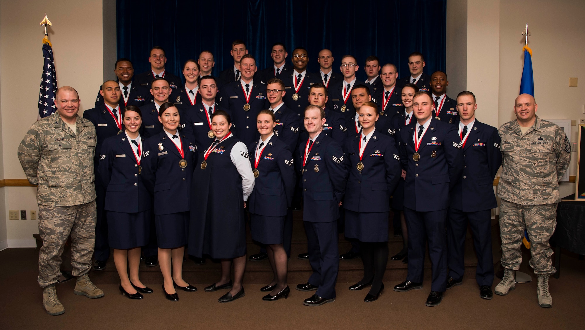 Col. Matthew Dillow, 90th Missile Wing vice commander and Chief Master Sgt. Jeffery Steagall, 90th Missile Wing command chief, pose with the graduating Airman Leadership School Class 17-C students at F.E. Warren Air Force Base, Wyo., Feb. 8, 2017. Enlisted Airmen must complete the rigorous professional military education course to become supervisors of other Airmen. (U.S. Air Force photo by Staff Sgt. Christopher Ruano)