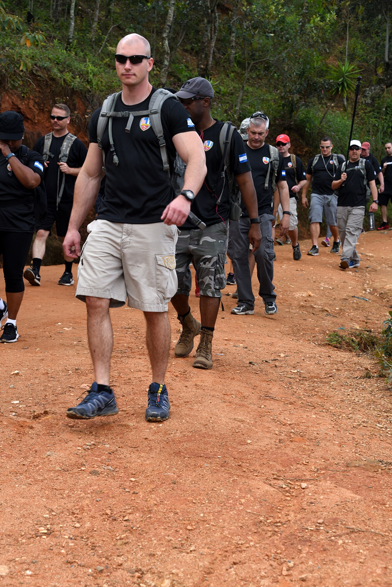 Approximately 180 members of Joint Task Force Bravo hiked four miles round-trip to the village of El Parasio Feb. 4 to deliver food and supplies to the underdeveloped community.  Referred to as Chapel Hikes, they are designed for servicemembers and civilians of Soto Cano Air Base in Honduras to further strengthen partner of choice relations with a host nation by helping out people in need. 
