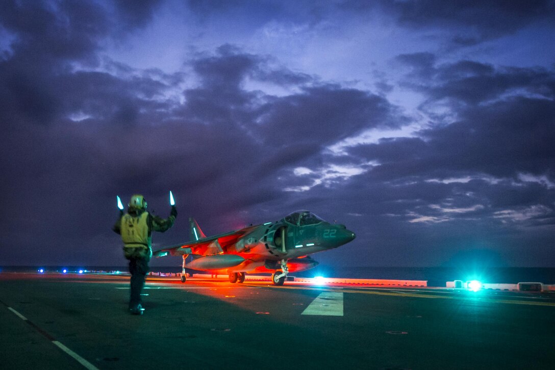An AV-8B Harrier II lands on the amphibious assault ship USS Bonhomme Richard in the Philippine Sea, Feb. 8, 2017. The ship is conducting unit-level training to ensure warfighting readiness to prepare for a routine patrol to support security and stability in the Indo-Asia Pacific region. The Harrier II is assigned to the Marine Attack Squadron 311. Navy photo by Petty Officer 2nd Class Diana Quinlan
