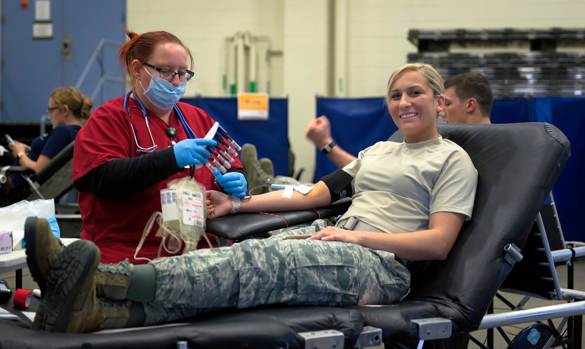 U.S. Air Force Senior Airman Hailey McFall, a fuels journeyman with the 182nd Logistics Readiness Squadron, Illinois Air National Guard, donates blood in Peoria, Ill., Feb. 5, 2017. McFall and other Airmen helped exceed the installation’s goal by 14%, which provided 57 pints of blood during a national emergency need appeal by the American Red Cross. (U.S. Air National Guard photo by Tech. Sgt. Lealan Buehrer)