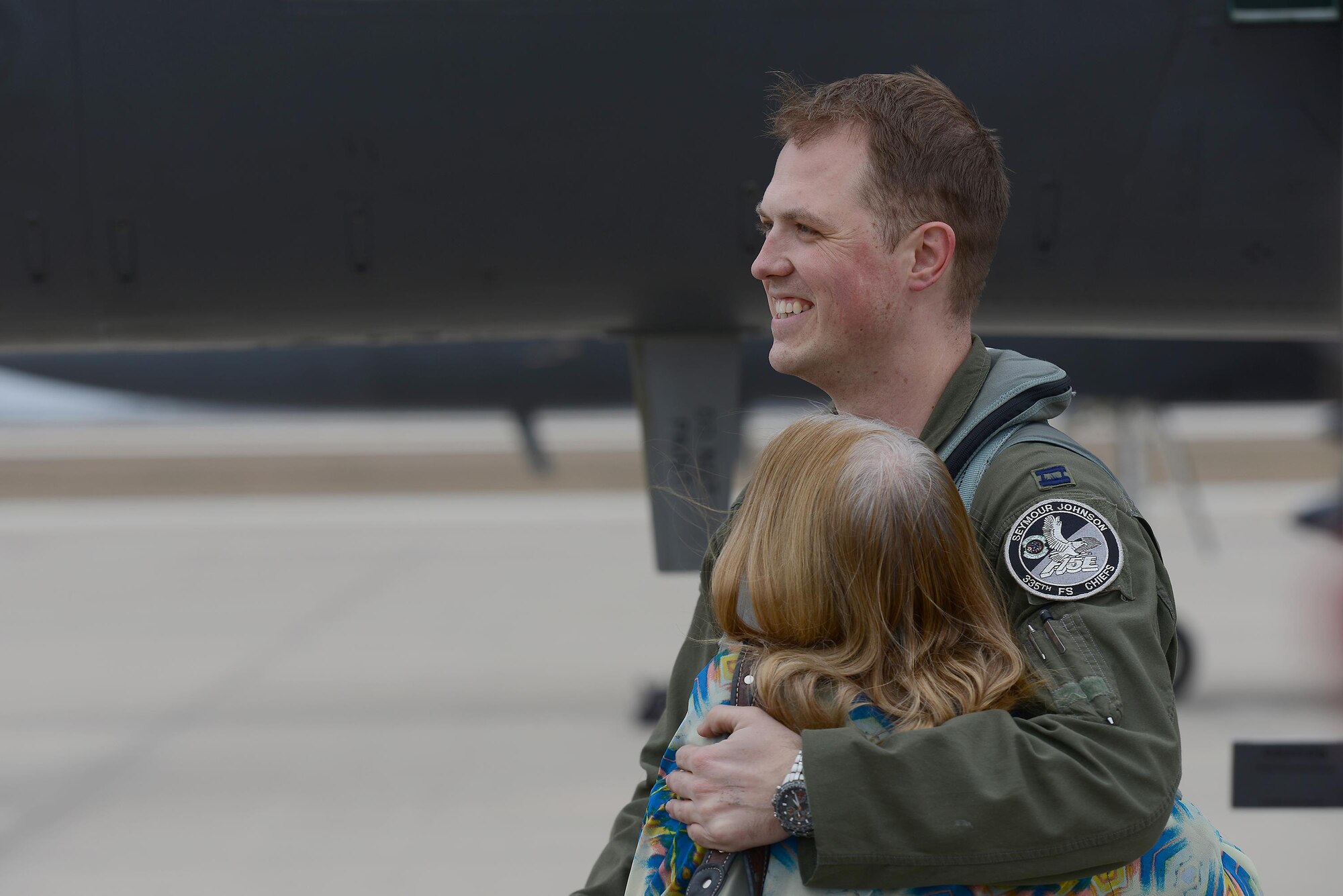 Capt. Michael Broyles, 335th Fighter Squadron weapons system officer (right), hugs his mother, Jill Broyles, on Laughlin Air Force Base, Texas, Feb. 3, 2017. Broyles visited his parents, who also served previously on Laughlin, during his stay while on a cross country trip in his aircraft. (U.S. Air Force photo/Airman 1st Class Benjamin N. Valmoja)