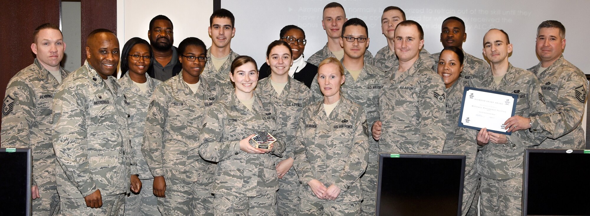 The 14th Force Support Squadron Military Personnel Flight receives the 2016 fourth Quarter Diamond Sharp Award Feb. 2, 2017, for their outstanding performance at Columbus Air Force Base, Mississippi. The Diamond Sharp Award is a recognition program run by the Columbus AFB first sergeants recognizing Airmen on a quarterly basis. The criteria for being nominated can be for outstanding service, selfless acts, or leadership traits that make an individual or team stand out amongst their peers. During the 4th quarter the MPS team consistently showed exceptional customer service, great follow up with leadership, and qualities of a High Performance Organization. (U.S. Air Force photo by Melissa Doublin)