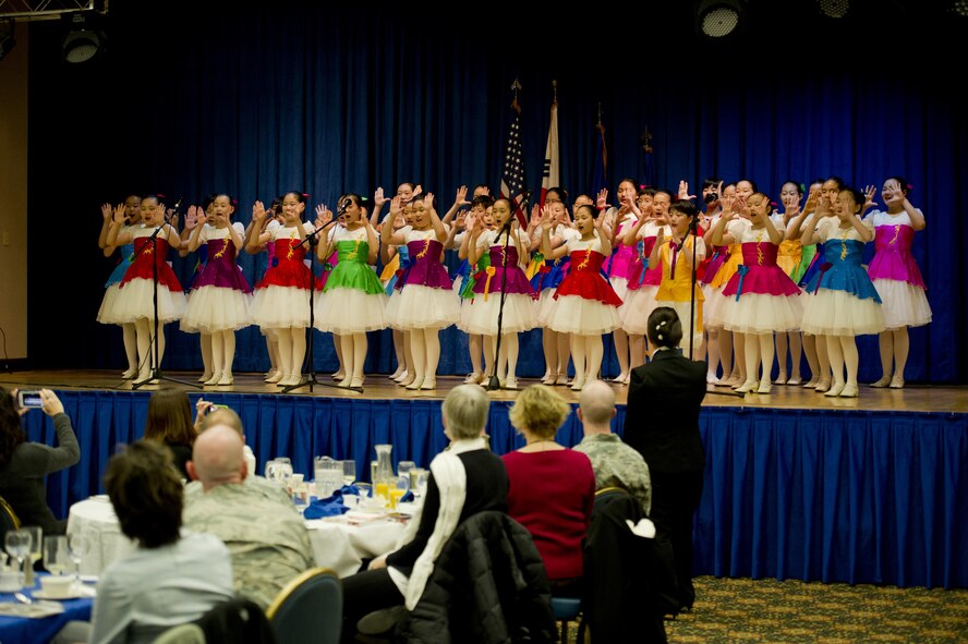 The Far East Broadcasting Company Children’s Choir performs at Osan’s National Prayer Breakfast 2017 at Osan Air Base, Republic of Korea, Feb. 8, 2017. The children’s choir has performed in a variety of countries, to include; the U.S., Canada, Australia, and Europe. (U.S. Air Force photo by Staff Sgt. Jonathan Steffen)