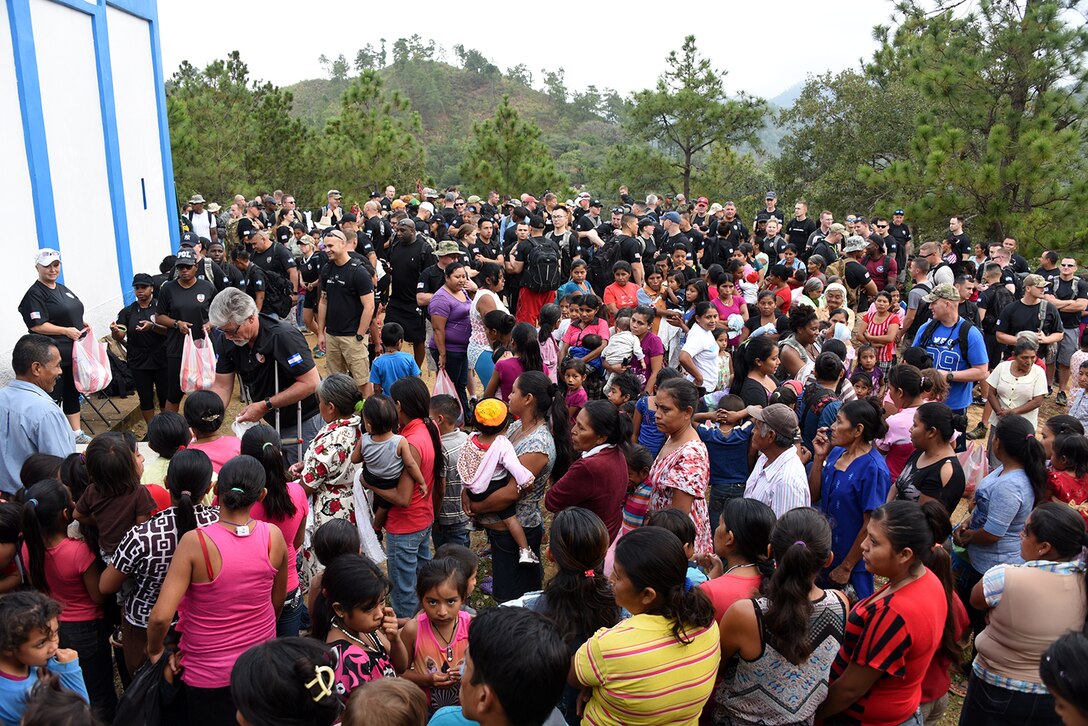 Roughly 180 service members and civilian from Joint Task Bravo at Soto Cano Air Base in Honduras hiked four miles round-trip to the village of El Parasio Feb 4. To bring food and supplies to the people. These hikes are an opportunity for servicemembers and civilians to build partner relation capacity with host nations by delivering food and supplies to communities in need in the Comayagua Valley. 