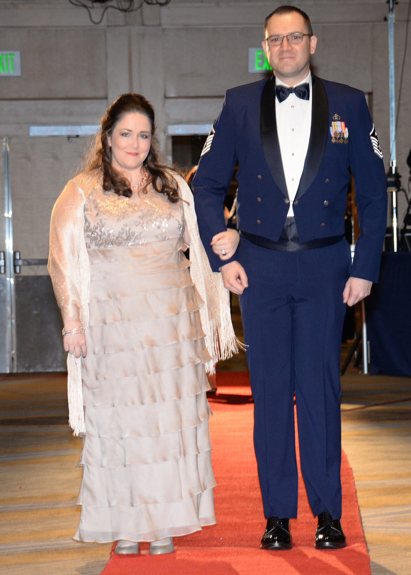 146th Airlift Wing's Master Sgt. Joshua Baker and his wife Kelly walk the red carpet at the 2017 Outstanding soldier/Airman of the Year Banquet. Baker took the prize in the state's First Sergeant category. (U.S. ANG photo by: Staff Sgt. Kim Ramirez)