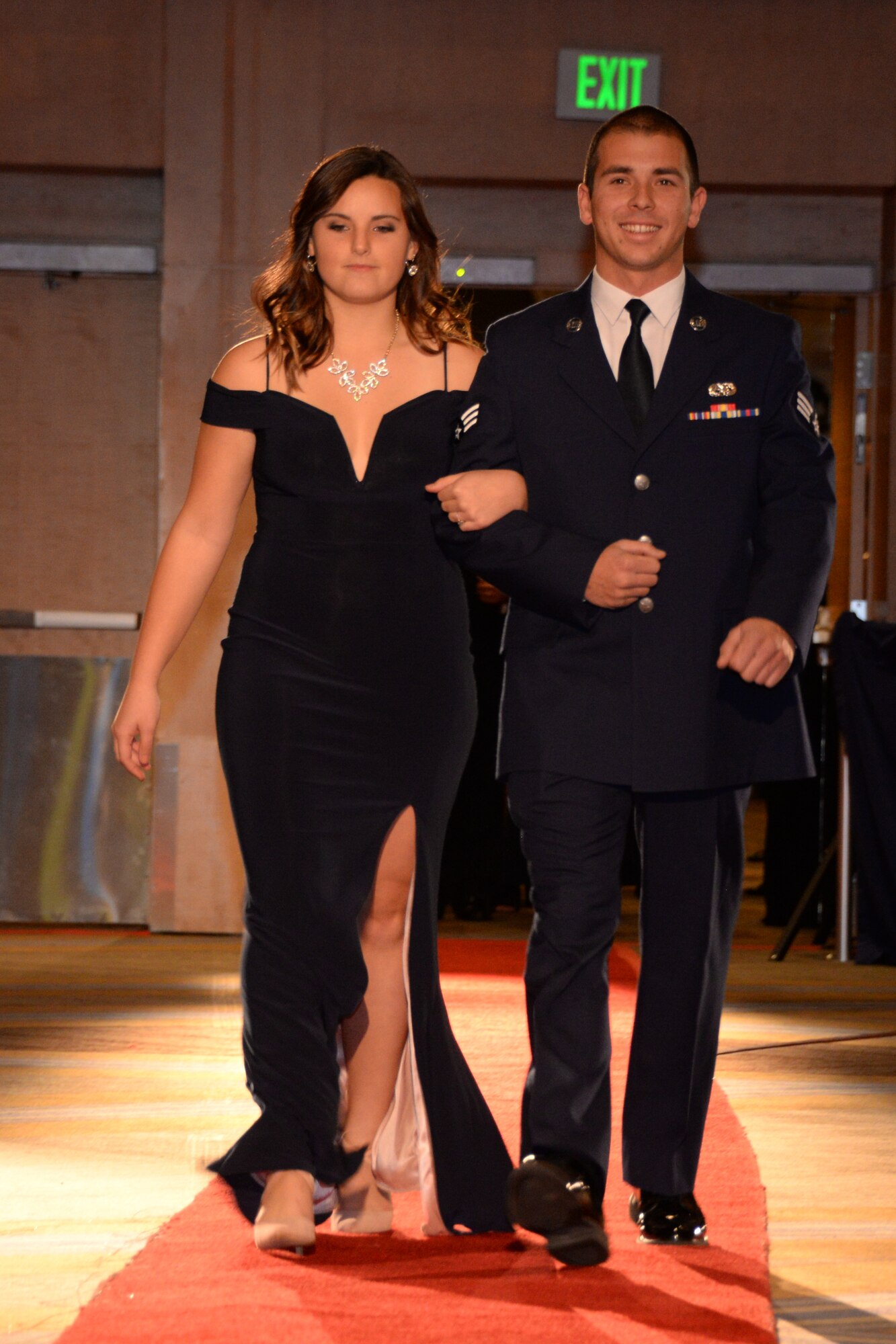 146th Airlift Wing's Senior Airman Ryan Anzil walks the red carpet with his girlfriend at the 2017 Annual Outstanding Soldier/Airman of the Year Banquet. (U.S. ANG photo by: Staff Sgt. Kim Ramirez)