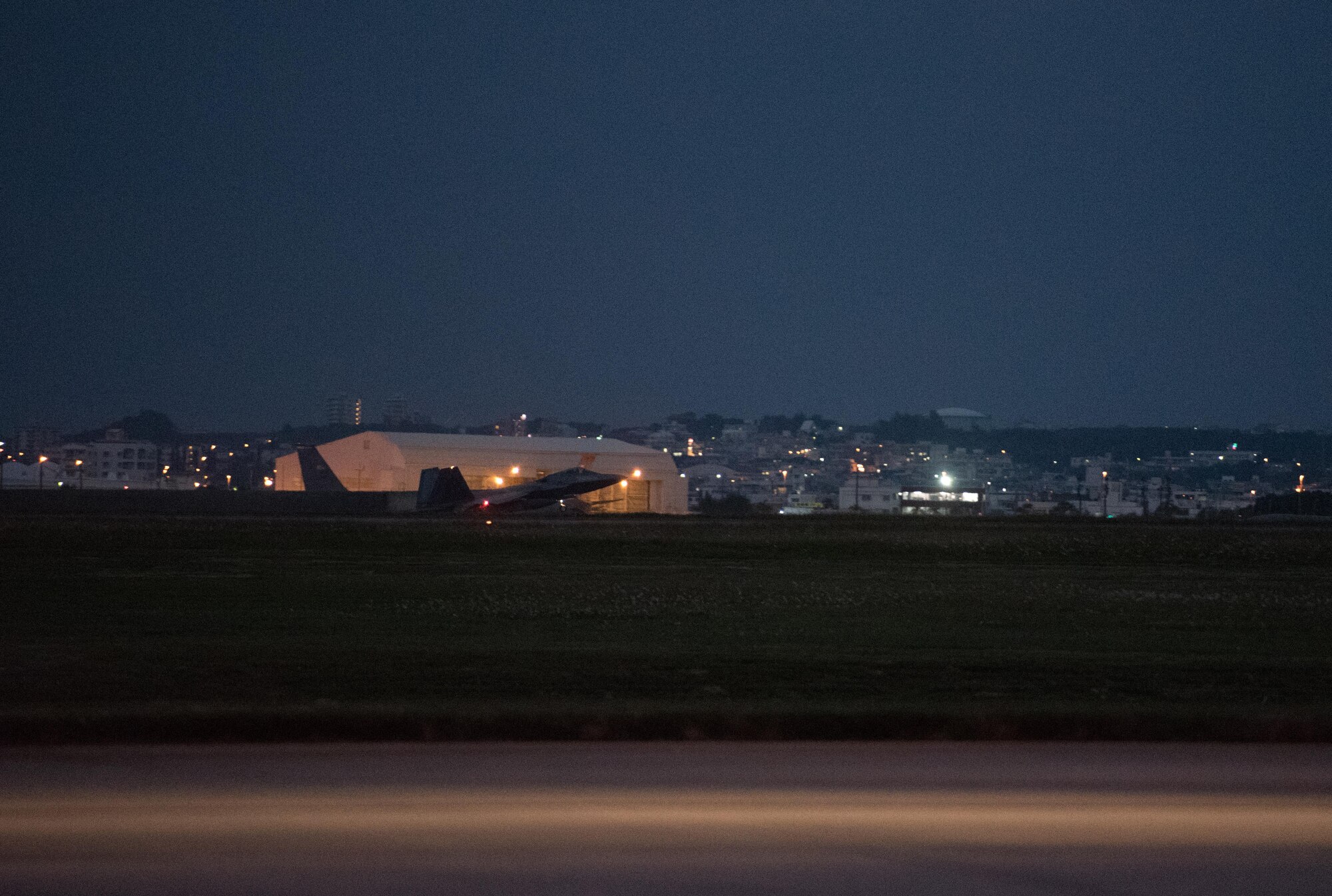 U.S. Air Force F-22 Raptors from the 90th Fighter Squadron arrive at Kadena Air Base, Japan, Feb. 7, 2017, before traveling on to Royal Australian Air Force Base, Tindal. The U.S. Air Force and the RAAF train together as part of the U.S. and Australian Enhanced Air Cooperation Agreement. Enhanced air cooperation increases both the U.S. and Australia’s combined capabilities, improving security and stability throughout the Indo-Asia-Pacific region. (U.S. Air Force photo by Senior Airman Omari Bernard/Released)