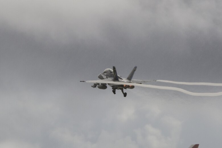 An F/A-18D Hornet with Marine All-Weather Fighter Attack Squadron (VMFA) – 225 takes flight during exercise Cope North at Andersen Air Force Base, Guam, Feb. 9, 2017. The Marines loaded live air intercept missile – 120 advanced medium-range air-to-air missiles (AIM-120 AMRAAM) to F/A-18D Hornets to be fired at decoys down range. (U.S. Marine Corps photos by Cpl. Nathan Wicks)