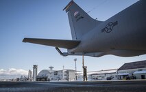 U.S. Air Force Tech. Sgt. Jeremy Pekins, a 718th Aircraft Maintenance Squadron flying crew chief from Kadena Air Base, Japan, connects a tail-stand to a KC-135 Stratotanker assigned to the 733rd Air Mobility Squadron out of Kadena, at Misawa Air Base, Japan, Jan. 19, 2017. The Air Mobility Command's four core mission areas -airlift, air refueling, air mobility and support- aids the Pacific Command mission of enhancing U.S. presence in the region by strategically distributing our posture over a wider geographic range. (U.S. Air Force photo by Airman 1st Class Sadie Colbert)