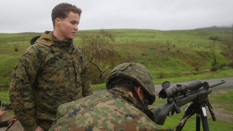 Sgt. Justin Adams, an instructor with 1st Marine Division Schools ‘Pre-Scout Sniper Course’ observes a soldier with the Japanese Ground Self-Defense Force during a known distance range conducted at during Exercise Iron Fist 2017, aboard Camp Pendleton, California, Feb. 7, 2017. The range consisted of known distances of targets from 100 to 550 meters. Iron Fist is an annual, bilateral training exercise where U.S. and Japanese service members train together and share techniques, tactics and procedure to improve their combined operational capabilities.