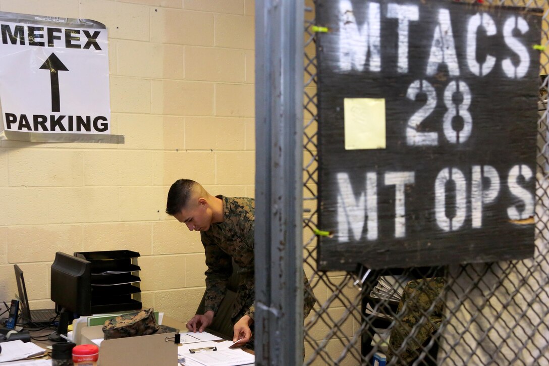 Sgt. Ryan Tugas evaluates paperwork aboard Marine Corps Air Station Cherry Point, N.C., Jan. 31, 2017. While holding the assistant motor transport operations chief billet in the motor transport section of Marine Tactical Air Command Squadron 28, Tugas has meritoriously earned the rank of sergeant Feb. 2, 2017. Tugas is assigned to MTACS-28, Marine Air Control Group 28, 2nd Marine Aircraft Wing. (U.S. Marine Corps photo by Cpl. Jason Jimenez/ Released)