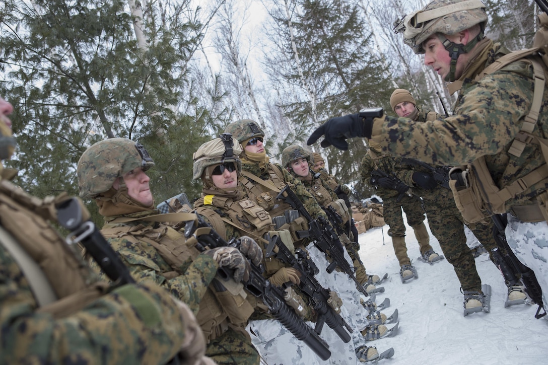 Marines prepare for a reconnaissance patrol during exercise Riley Xanten II in Burwash, Ontario, Feb. 4, 2017. During the exercise, the Marines used their cold weather gear and knowledge gained from their Canadian counterparts to hike through rough terrain, construct debris shelters, build fires more efficiently and procure food from ice fishing. The Marines are assigned to Charlie Company, 1st Battalion, 25th Marine Regiment. Marine Corps photo by Sgt. Sara Graham