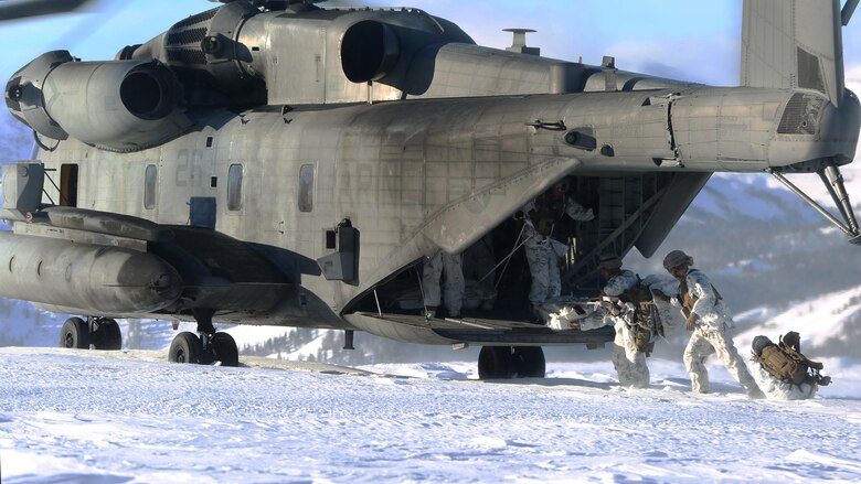 Marines with Marines with 2nd Battalion, 2nd Marine Division, board a CH-53E Super Stallion with Marine Heavy Helicopter Squadron 462 “Heavy Haulers” before performing an insertion at Marine Corps Mountain Warfare Training Center, Bridgeport, Calif., Feb. 1, 2017. Without support from HMH-462, ground units would have hiked nearly 1,500 meters above sea level to arrive at the objective site.