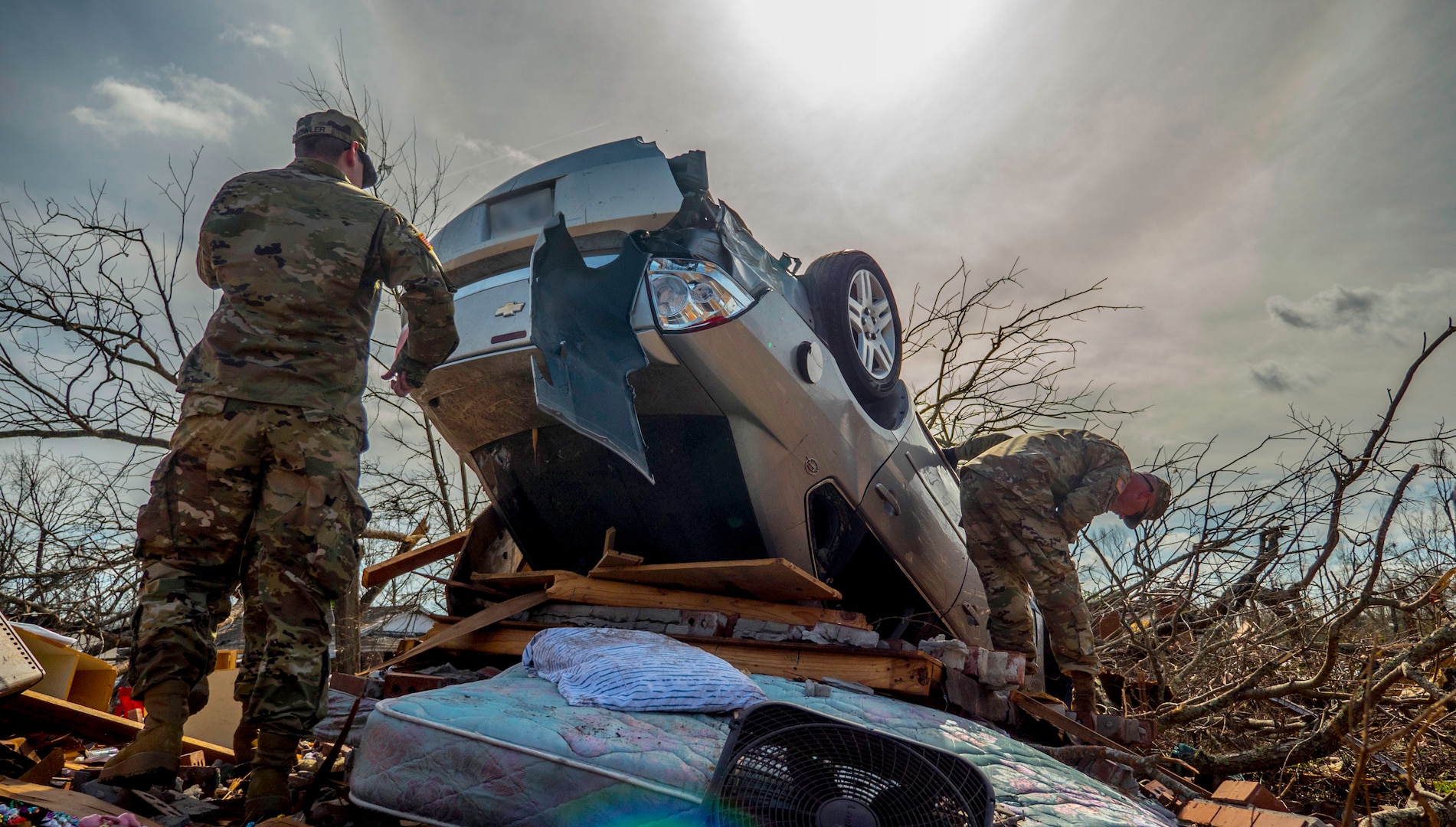 Soldiers of the 3656th Maintenance Co., 184th Sustainment Command, assist local authorities in disaster relief efforts after a tornado swept across southern Mississippi on Jan. 26, 2017. Four people were killed by the twister and more than 16,000 homes and businesses across Mississippi were without electricity when the storm swept across parts of eight counties