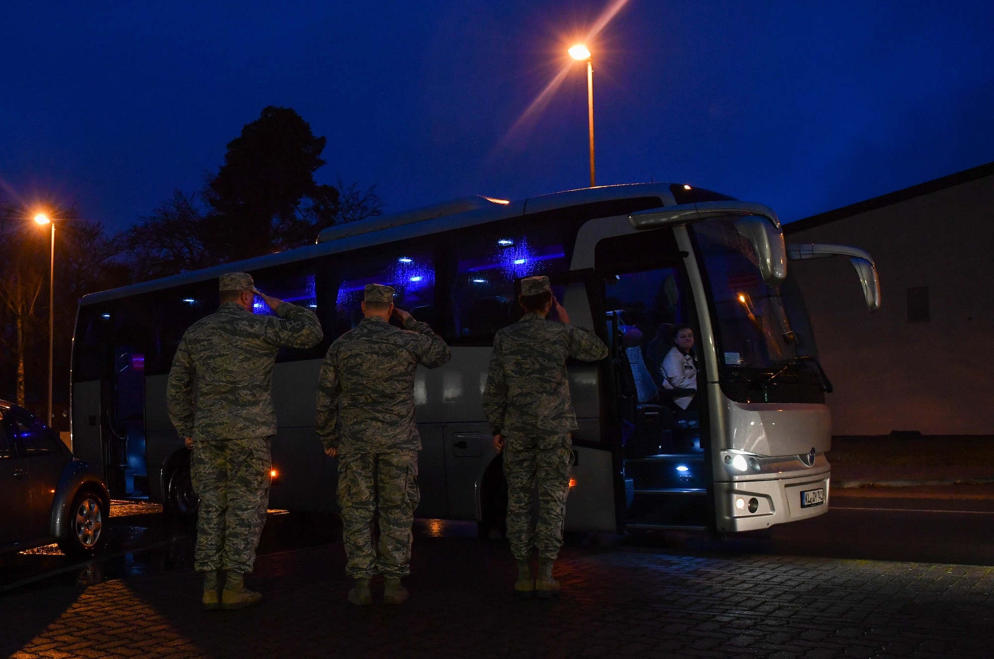 Col. Andra V.P. Kniep, right, 435th Air Ground Operations Wing commander, and other leaders salute the arrival of Lt. Gen. Richard M. Clark, 3rd Air Force commander, for an immersion tour of the 435 AGOW at Ramstein Air Base, Germany, Feb. 3, 2017. The purpose of the tour was to showcase the wing’s capabilities to Clark, who assumed command of the 3rd Air Force in October 2016. (U.S. Air Force photo by Senior Airman Tryphena Mayhugh) 