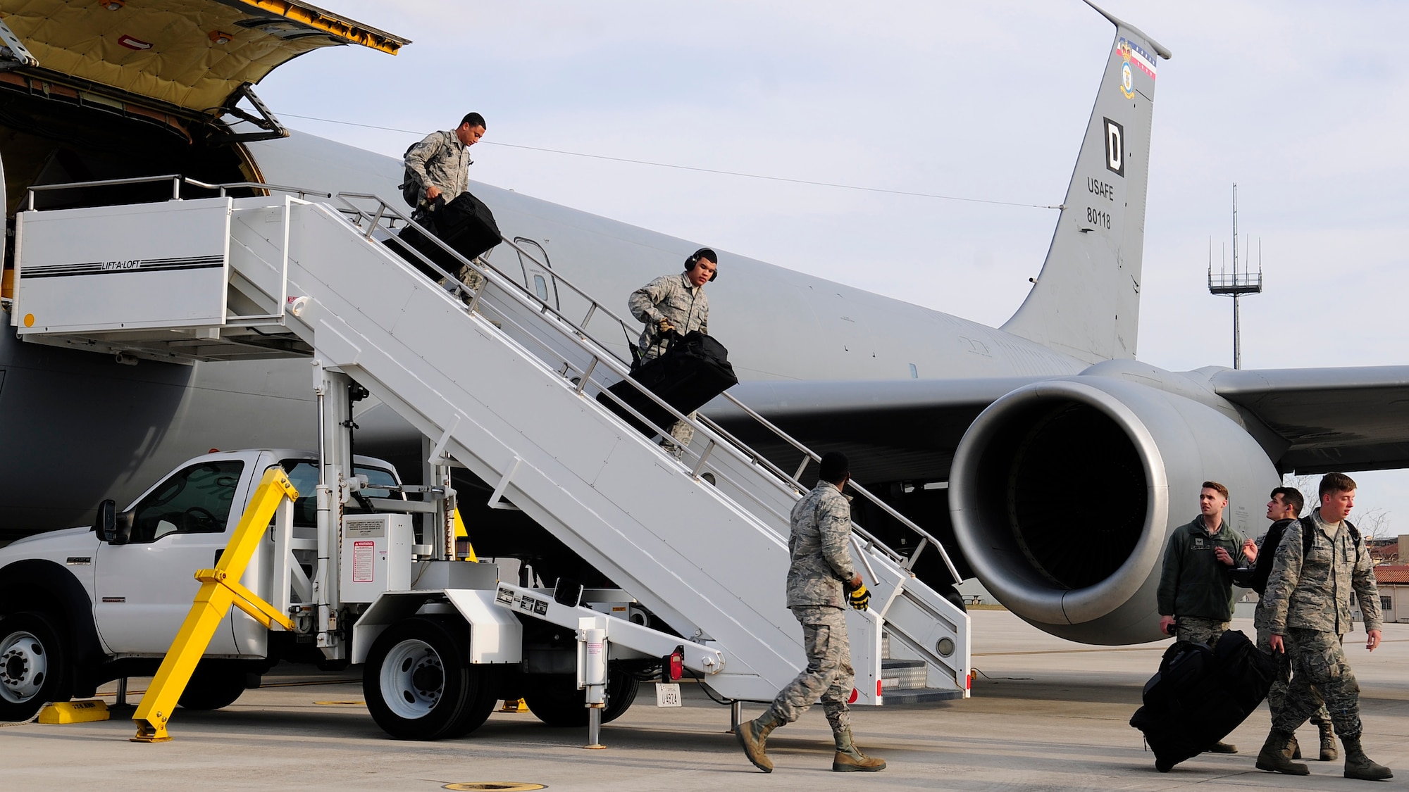 Airmen from the 31st Fighter Wing return to Aviano Air Base, Italy, from Camp Lemonnier, Djibouti, Feb. 9, 2017, after a seven month deployment. In July 2016, the U.S. Air Force forward deployed the 31st FW F-16s, 100th Air Refueling Wing KC-135 Stratotankers from Royal Air Force Mildenhall, United Kingdom, Airmen and equipment to Camp Lemonnier as a precautionary measure to protect Americans and American interests based on violent unrest and the possibility of threats in South Sudan. (U.S. Air Force photo by Staff Sgt. Austin Harvill)