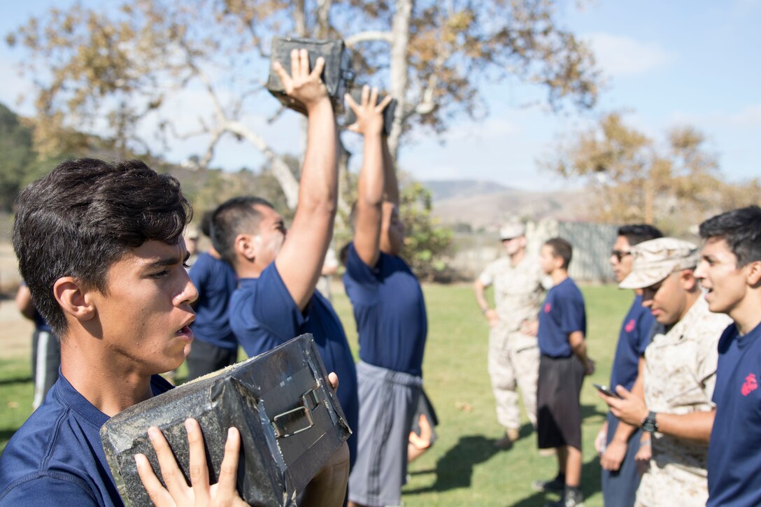 Future Marines with Recruiting Sub-Station La Puente and San Bernardino conduct ammo can lifts during a CFT Oct 17. The RSS’ went to the School of Infantry West to conduct a CFT, learn about Marine Corps Weapon systems and build comradery. 