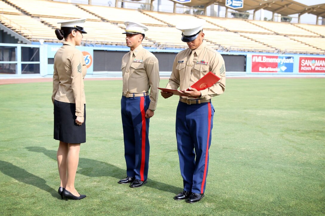 SSgt Jasmin Duran is re-enlisted at Dodger Stadium Nov. 16. Duran decided to conduct her re-enlistment at the stadium because it is her favorite Baseball Team. 