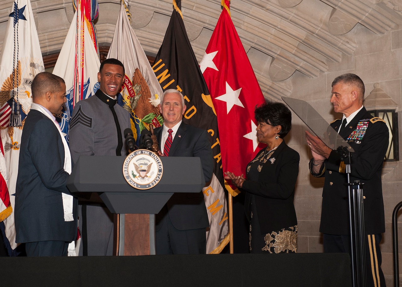 West Point Cadet Christian Nattiel, the U.S. Military Academy’s first African-American Rhodes Scholar, and retired Army Major Pat Locke, the first female African-American USMA graduate, present a bust to Vice President Mike Pence during the Lieutenant Henry O. Flipper Dinner at the academy in West Point, N.Y., Feb. 9, 2017. The dinner is held annually to commemorate the life of Flipper, West Point’s first African-American graduate. Army photo by Carmine Cocchia