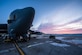 The sun rises behind a B-52H Stratofortress at Minot Air Force Base, N.D., Jan. 26, 2017. Airmen from the 5th Aircraft Maintenance Squadron work around the clock in all weather conditions to provide B-52 firepower on demand. (U.S. Air Force photo/Senior Airman J.T. Armstrong)