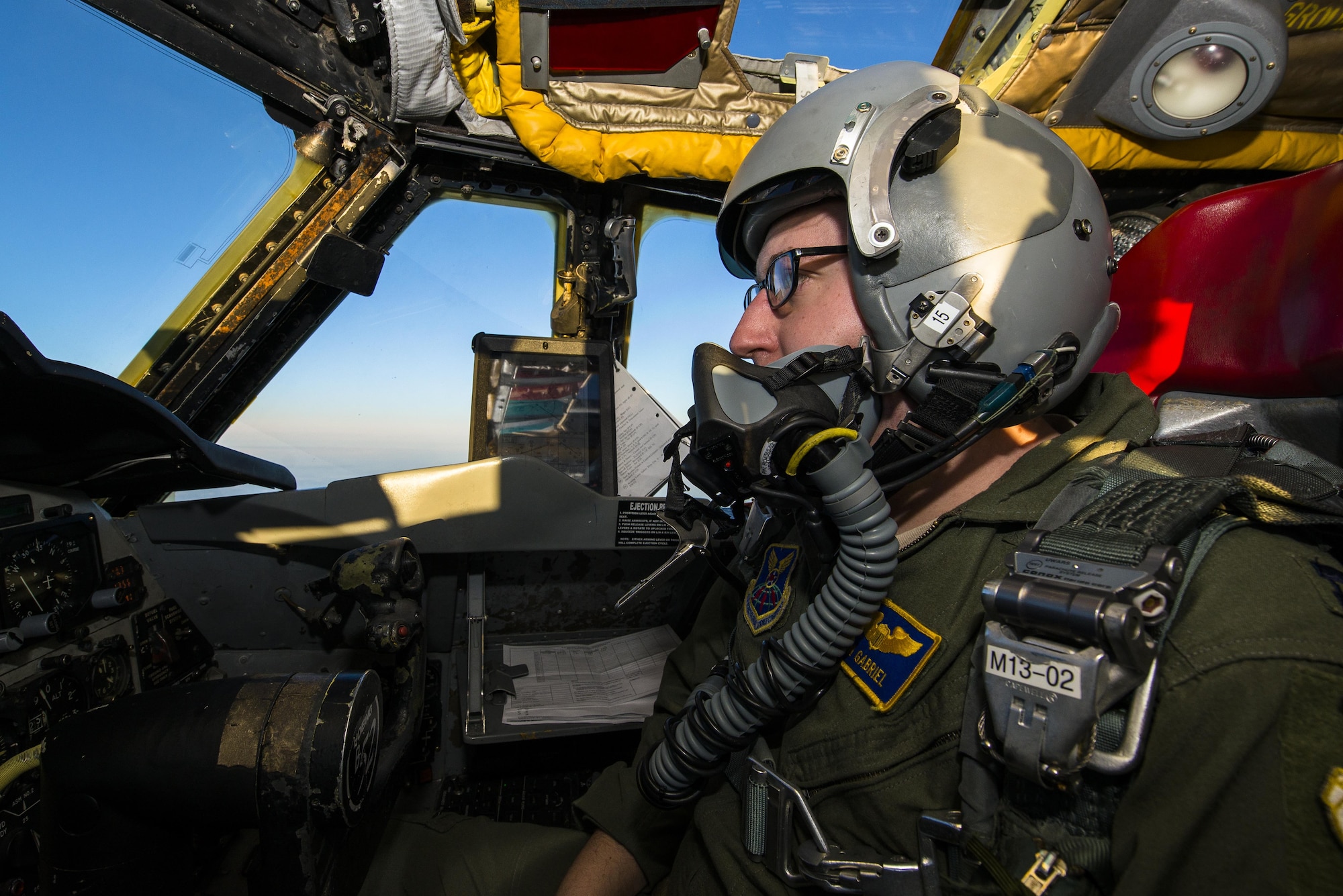 Capt. Jonathan Gabriel, 23rd Bomb Squadron aircraft commander, pilots a B-52H Stratofortress above the clouds of North Dakota, Jan. 31, 2017. Gabriel and Capt. Dane Weathers, 23rd BS aircraft commander, relied on their offensive and defensive team to successfully complete their training mission. (U.S. Air Force photo/Senior Airman J.T. Armstrong)