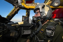 Capt. Jonathan Gabriel, 23rd Bomb Squadron aircraft commander, pilots a B-52H Stratofortress above the clouds of North Dakota, Jan. 31, 2017. Gabriel and Capt. Dane Weathers, 23rd BS aircraft commander, relied on their offensive and defensive team to successfully complete their training mission. (U.S. Air Force photo/Senior Airman J.T. Armstrong)
